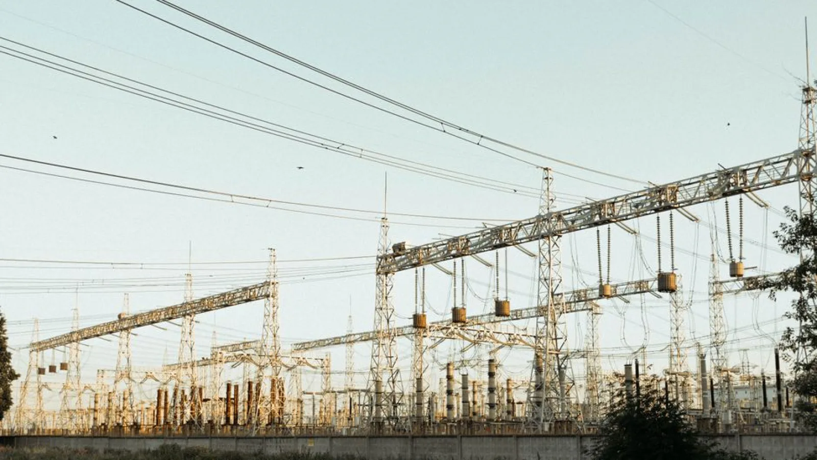 Modern electric power grid infrastructure with transmission towers